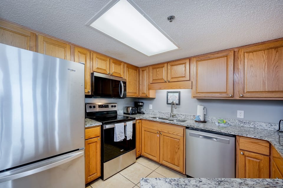 Condo, 2 Bedrooms | Private kitchen | Coffee/tea maker, fridge, oven