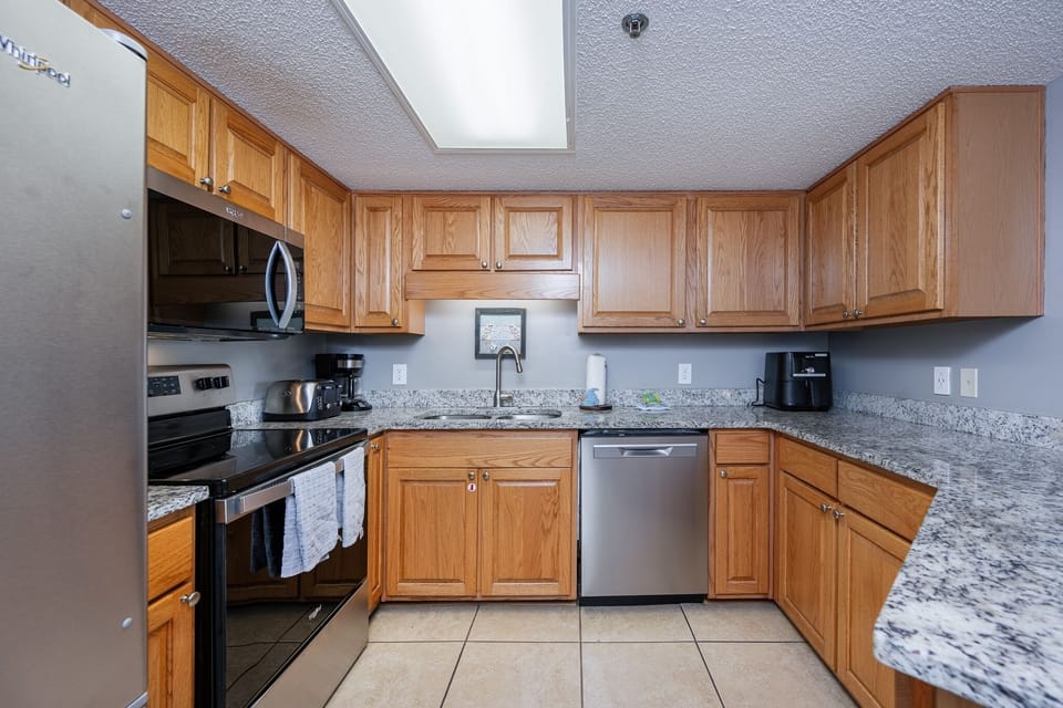 Condo, 2 Bedrooms | Private kitchen | Coffee/tea maker, fridge, oven