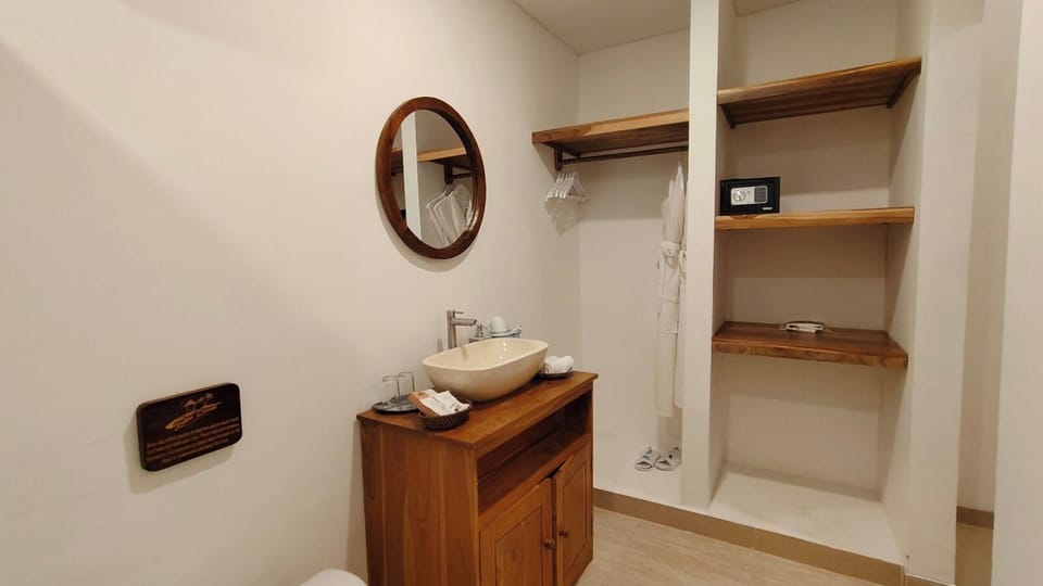 Standard Double Room | Bathroom | Shower, slippers, towels, soap