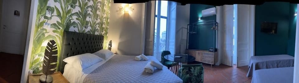 Deluxe Quadruple Room | Premium bedding, minibar, in-room safe, desk