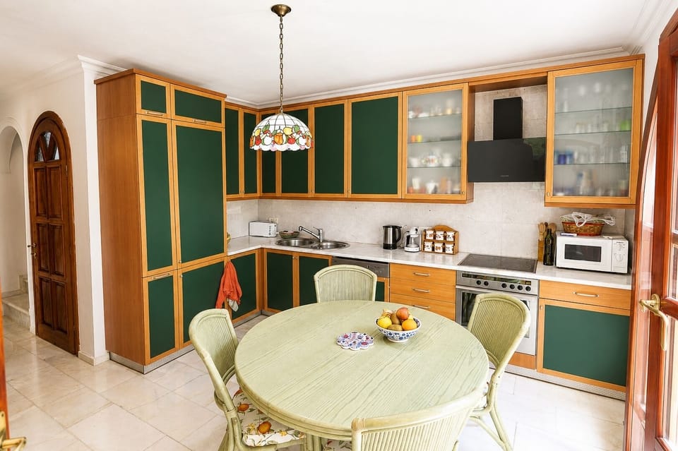 Villa | Private kitchen | Full-size fridge, microwave, oven, stovetop