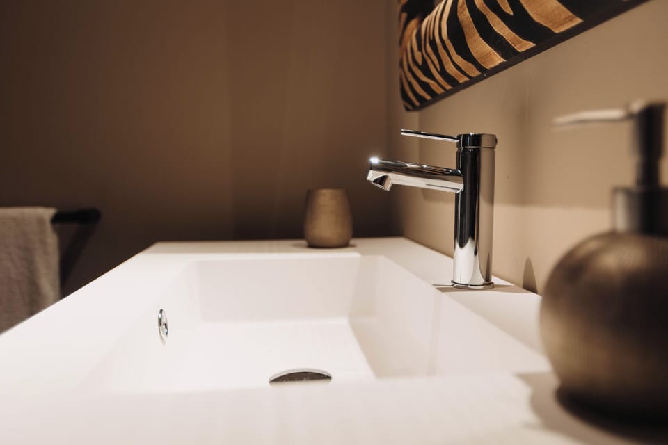 Superior Room, Courtyard View | Bathroom | Shower, hair dryer, towels, soap