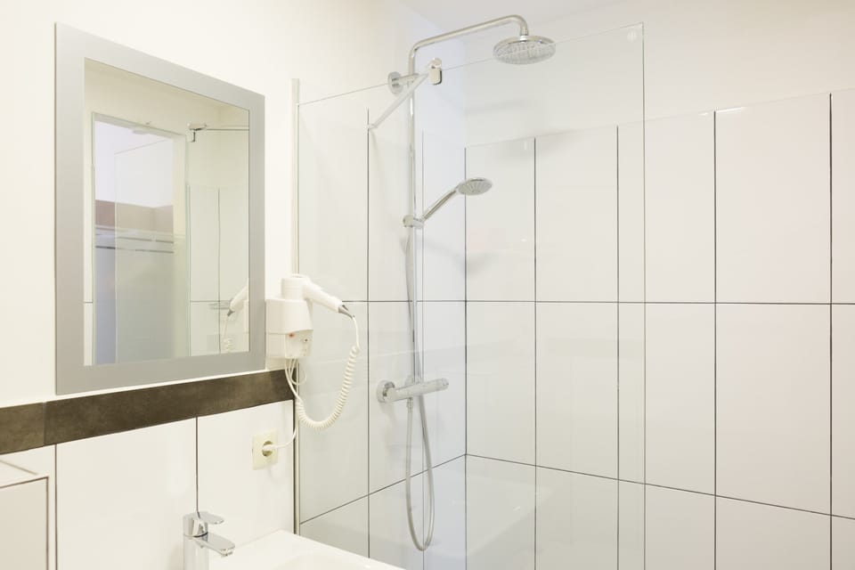 Hair dryer, towels, soap, shampoo