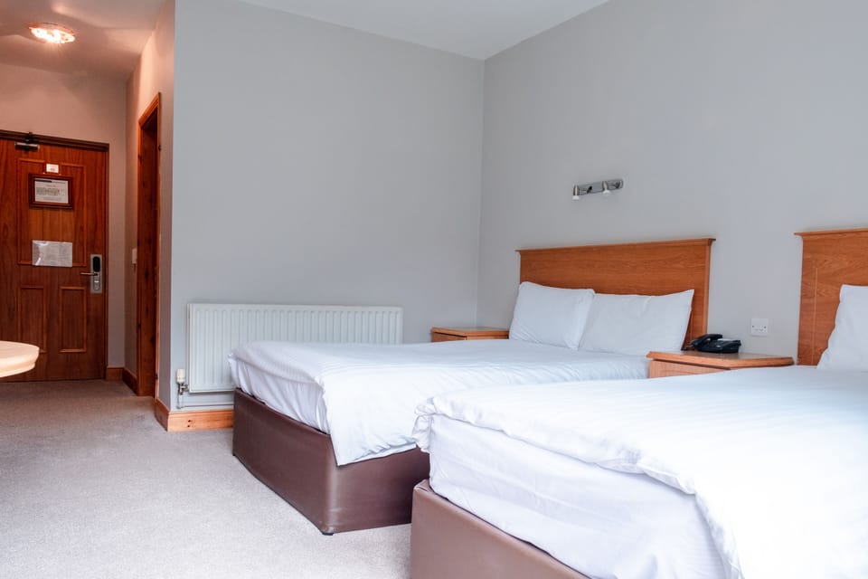 Pillowtop beds, desk, soundproofing, WiFi (free)