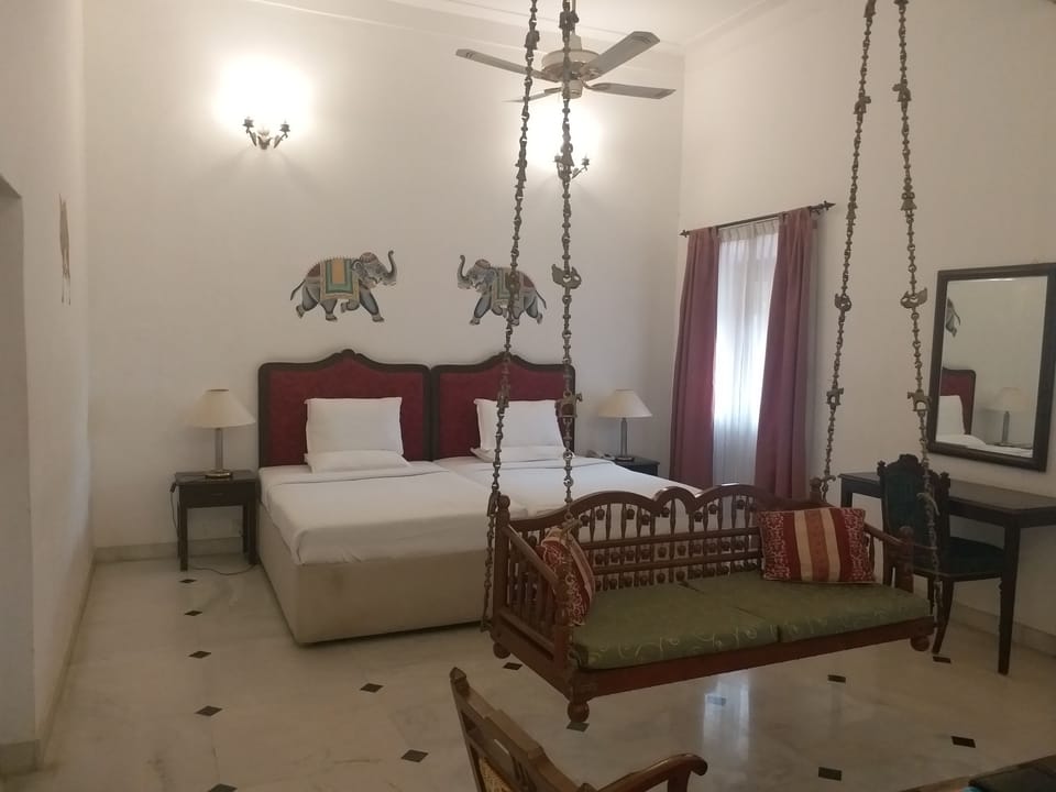 Luxury Suite, 1 King Bed | Living room | TV