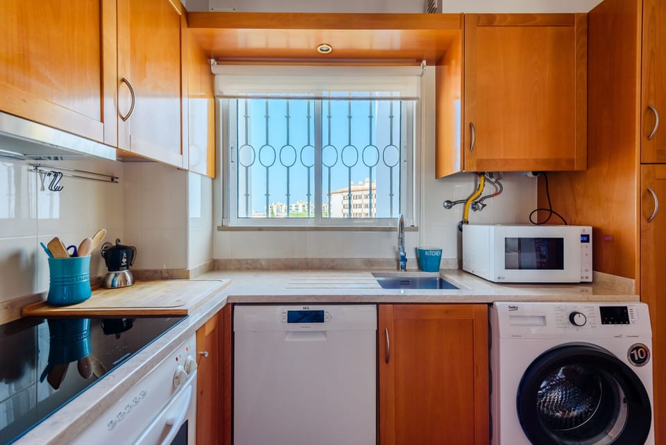 Coffee/tea maker, microwave, dishwasher, cookware/dishes/utensils