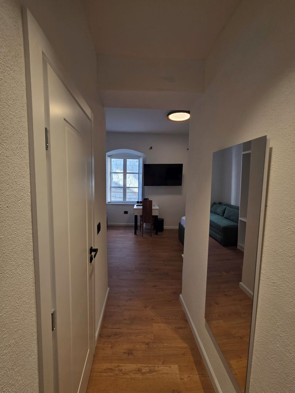 Deluxe Double Room, City View | Living area | 50-inch Smart TV with digital channels