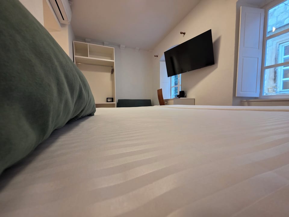 Deluxe Double Room, City View | Minibar, in-room safe, desk, laptop workspace