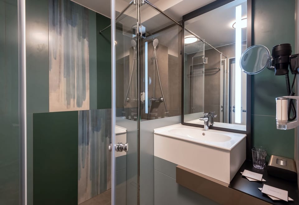 Standard Double or Twin Room | Bathroom | Shower, hair dryer, bathrobes, towels
