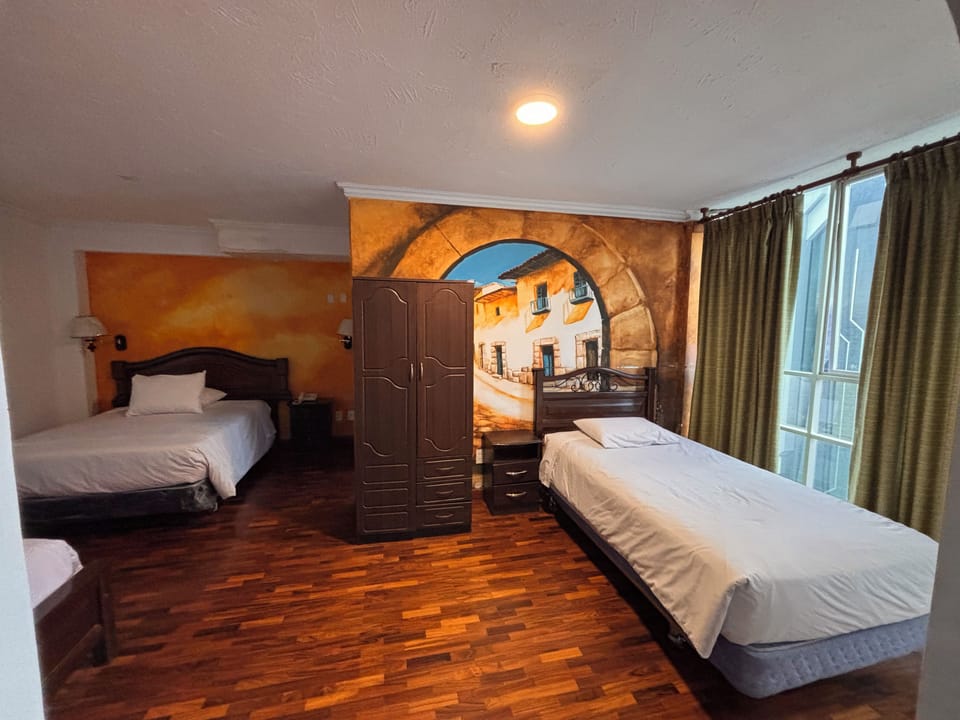 Apartment, City View | Desk, laptop workspace, WiFi (free), bed sheets