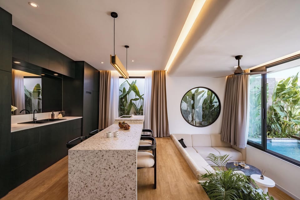 Deluxe Villa, 2 Bedrooms, Patio, Pool View | Living room | 65-inch TV with cable channels