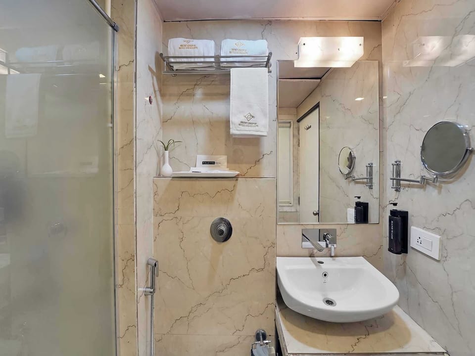 Shower, free toiletries, towels, soap