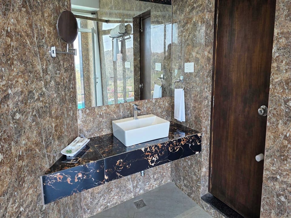 Shower, towels, soap, shampoo