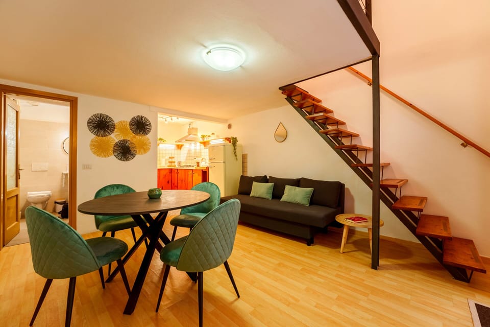 Apartment, 1 Bedroom | Living area | 30-inch TV with satellite channels