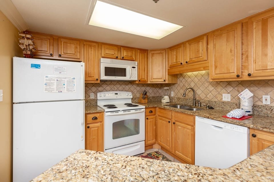 Condo, 2 Bedrooms | Private kitchen | Coffee/tea maker, fridge, oven