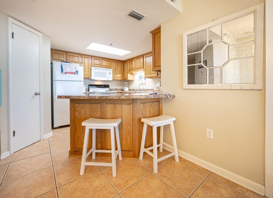 Condo, 2 Bedrooms | Private kitchen | Coffee/tea maker, fridge, oven