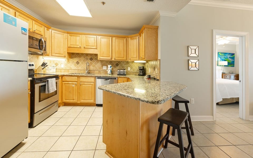 Condo, 2 Bedrooms | Private kitchen | Coffee/tea maker, fridge, oven