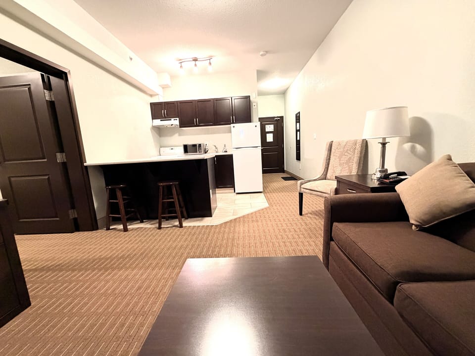 Executive Suite, 2 Bedrooms, Non Smoking | Desk, laptop workspace, iron/ironing board, WiFi (free)