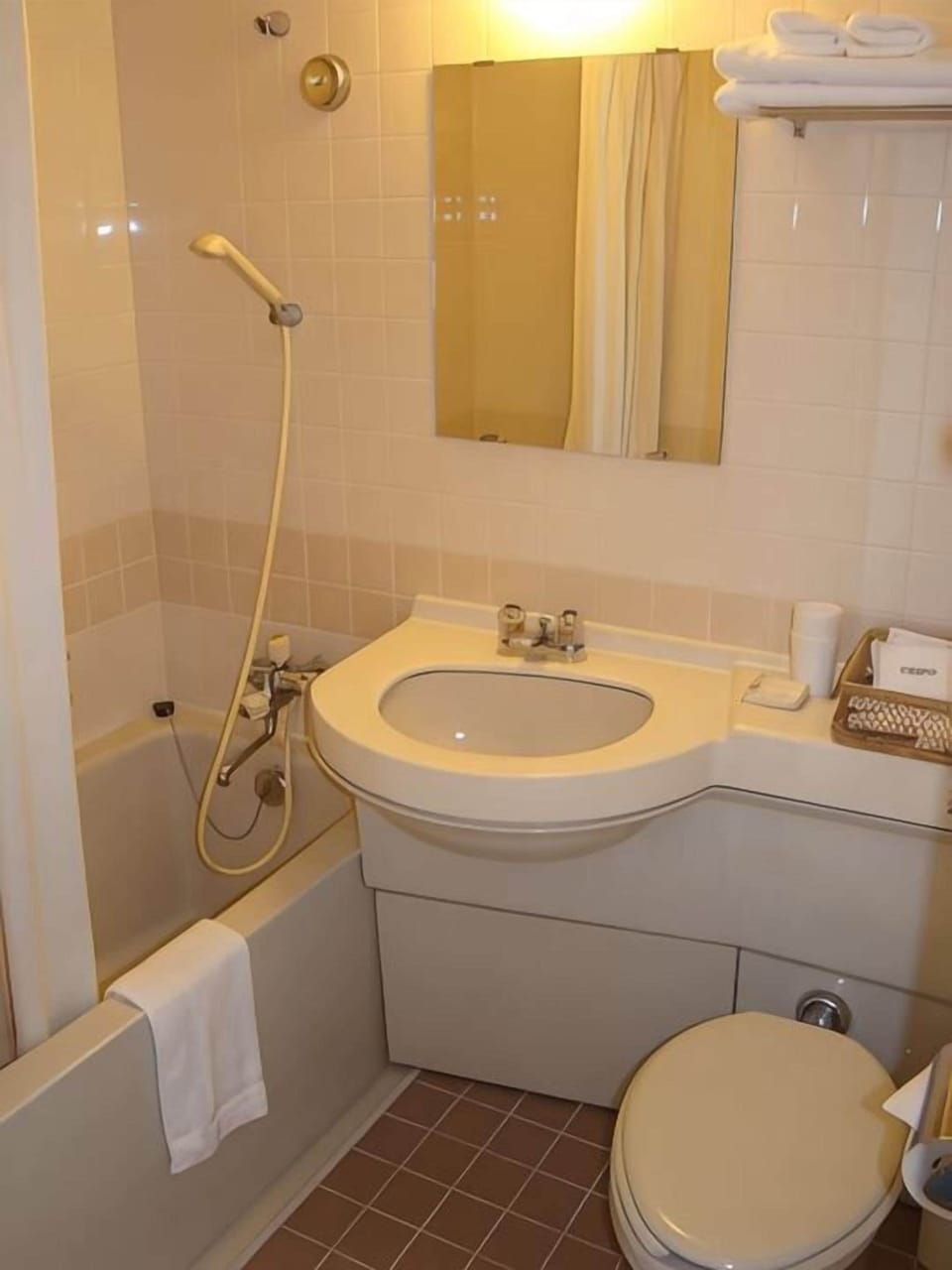 Combined shower/tub, hair dryer, towels, soap