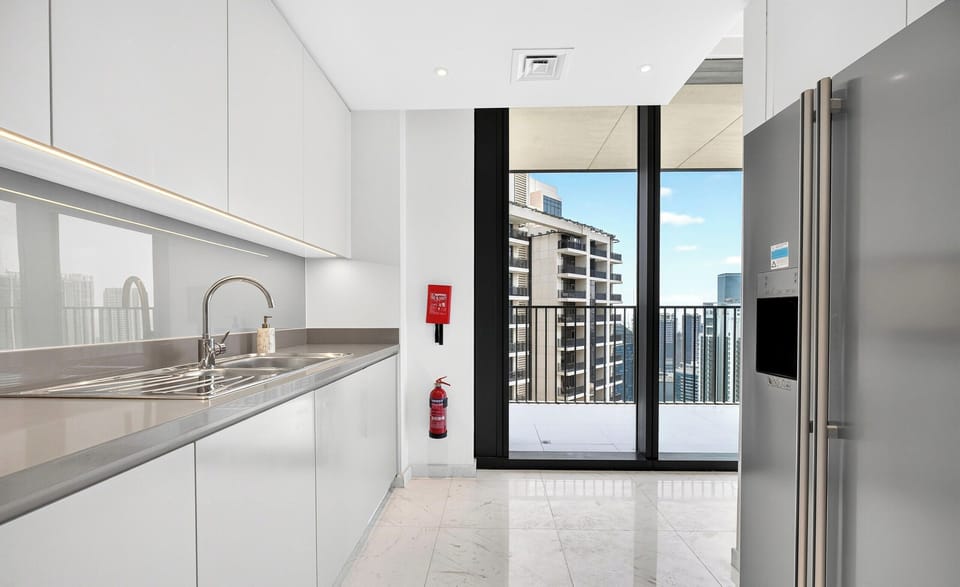 Executive Apartment, City View | Private kitchen | Coffee/tea maker