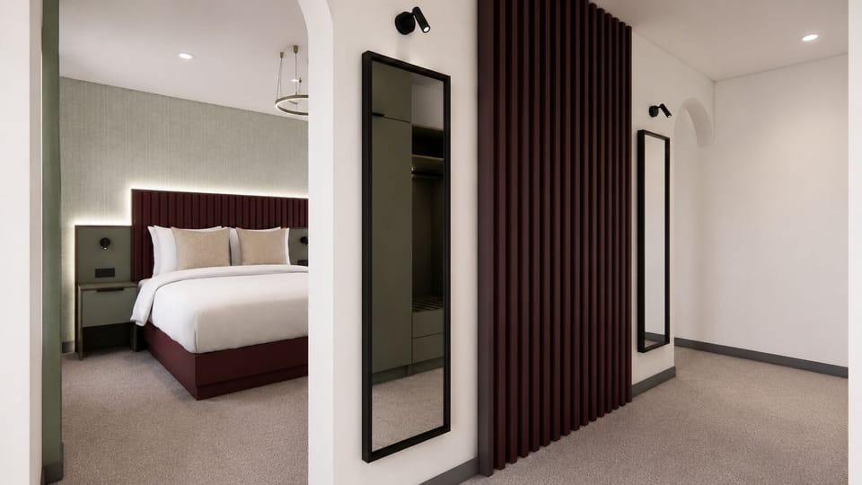 Superior Suite, Sea View | In-room safe, desk, laptop workspace, iron/ironing board