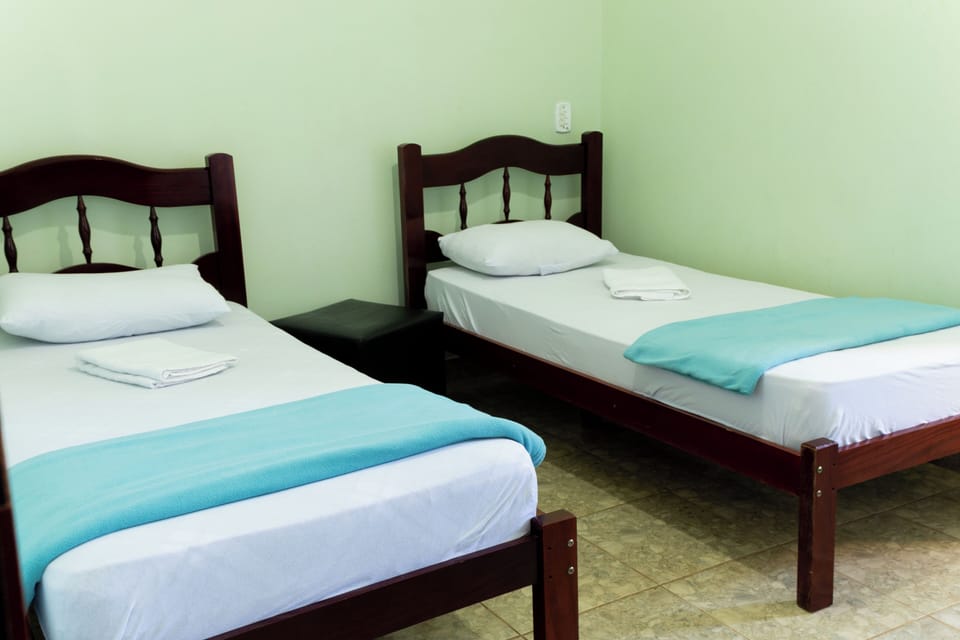 Desk, laptop workspace, WiFi (free), bed sheets