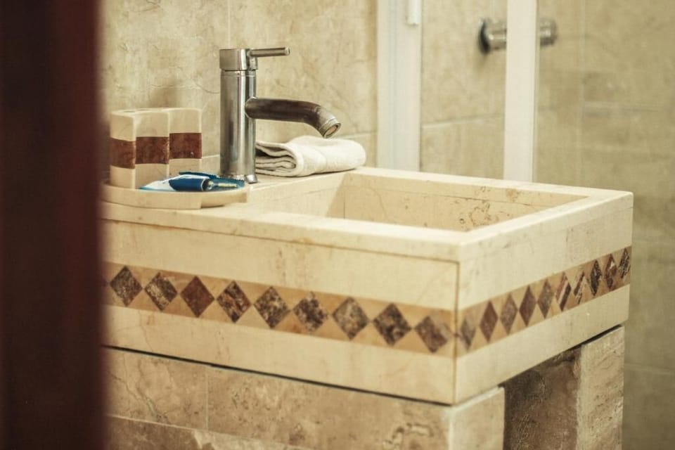 Basic Double Room | Bathroom | Shower, free toiletries, towels, shampoo