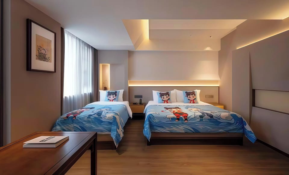 Family Twin Room, City View | Premium bedding, down comforters, memory foam beds, minibar