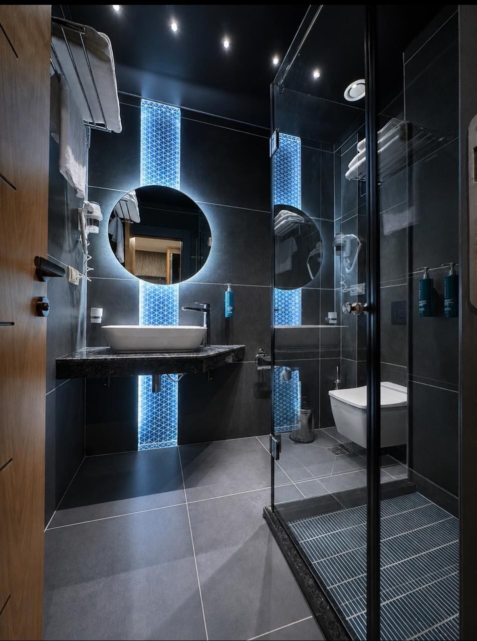 Shower, hair dryer, slippers, towels