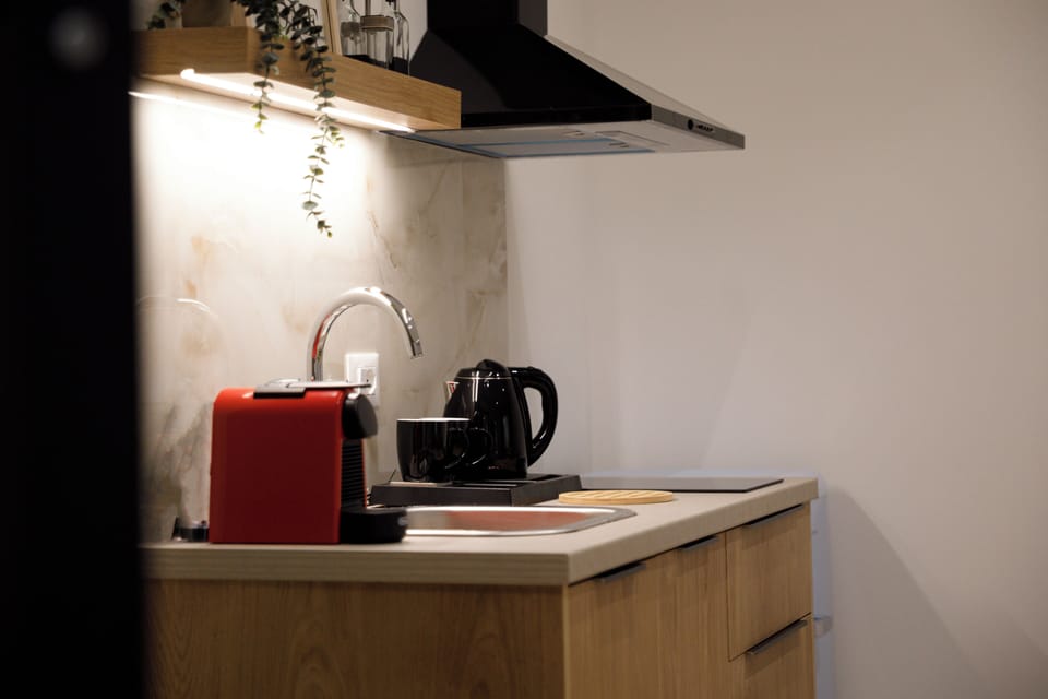 Deluxe Suite, Balcony, Sea View | Private kitchen | Coffee/tea maker, electric kettle