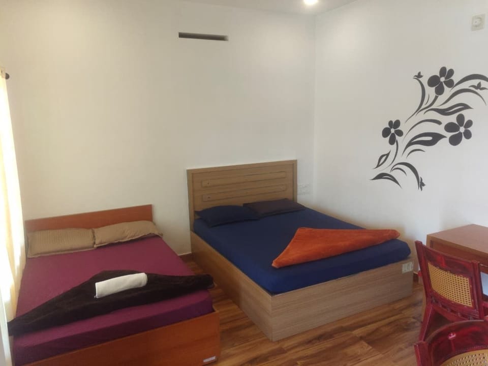 Standard Quadruple Room, 2 Double Beds, Mountain View | Laptop workspace, WiFi (free), individually decorated
