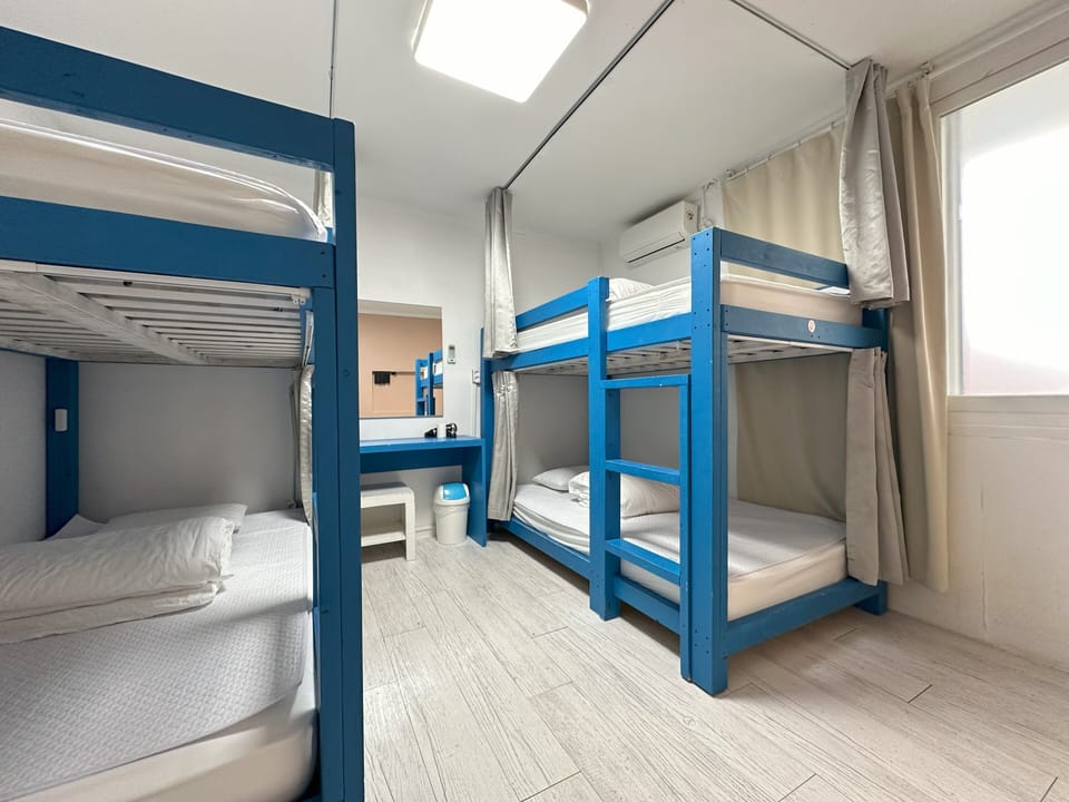 Shared Dormitory, Men only (4 people) | Blackout drapes, free WiFi, bed sheets