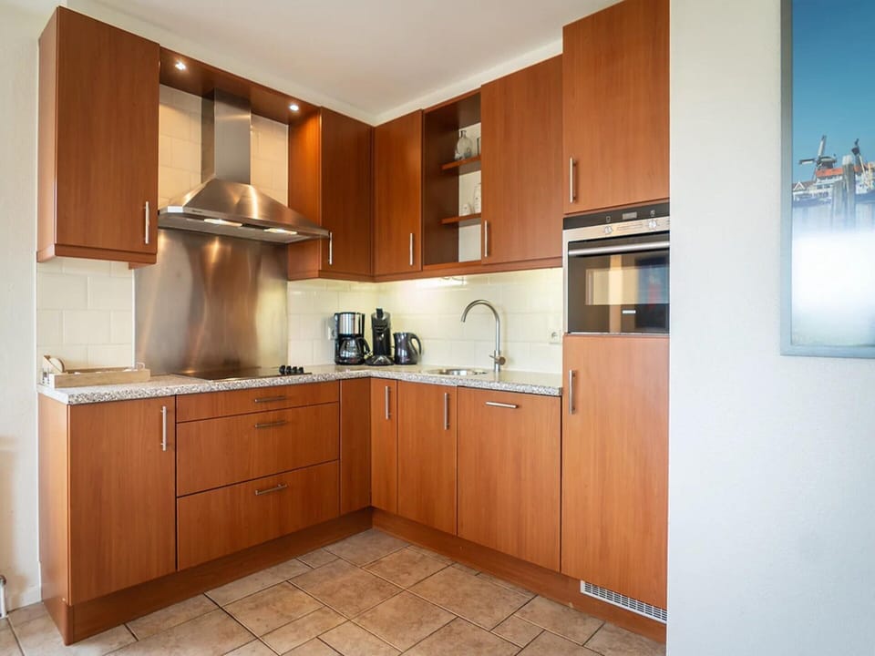 Villa | Private kitchen | Stovetop, highchair