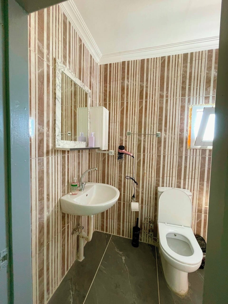 Quadruple Room | Bathroom | Shower, hair dryer, slippers, towels