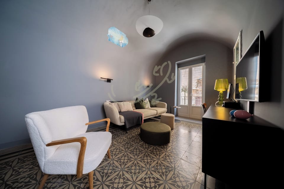 Apartment (2 Bedrooms) | Living area | 32-inch TV with cable channels