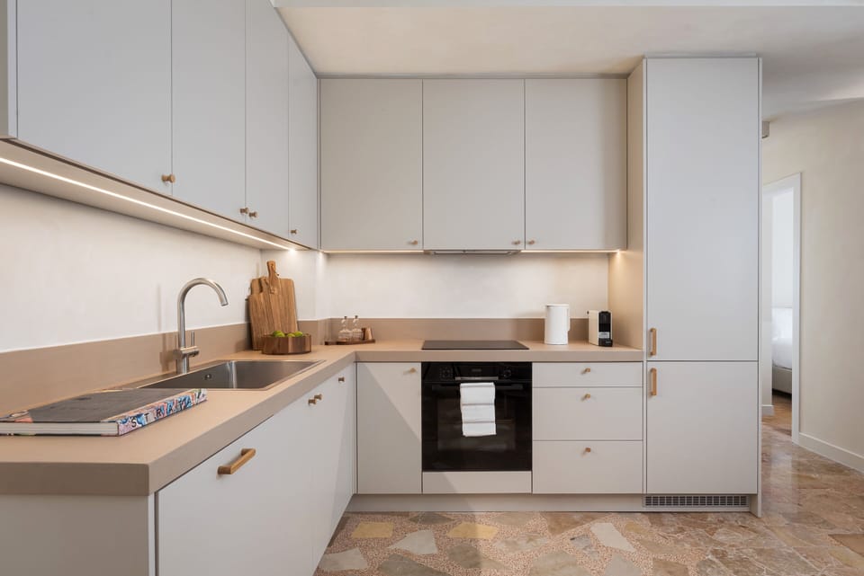 Deluxe Apartment | Private kitchen | Espresso maker, full-size fridge, microwave, oven