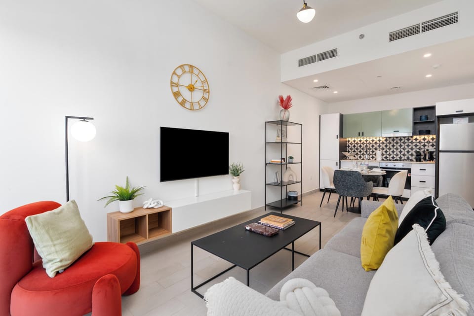 Deluxe Apartment, 2 Bedrooms, Balcony, Pool View | Living area | 52-inch flat-screen TV with cable channels, Netflix, streaming services
