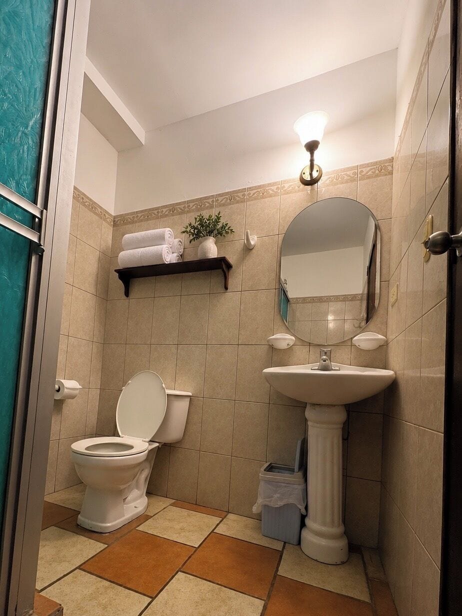 Deluxe Room, Pool View | Bathroom | Shower, free toiletries, towels, soap