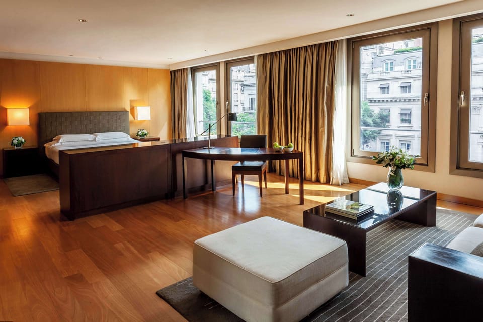 Premium bedding, down comforters, minibar, in-room safe
