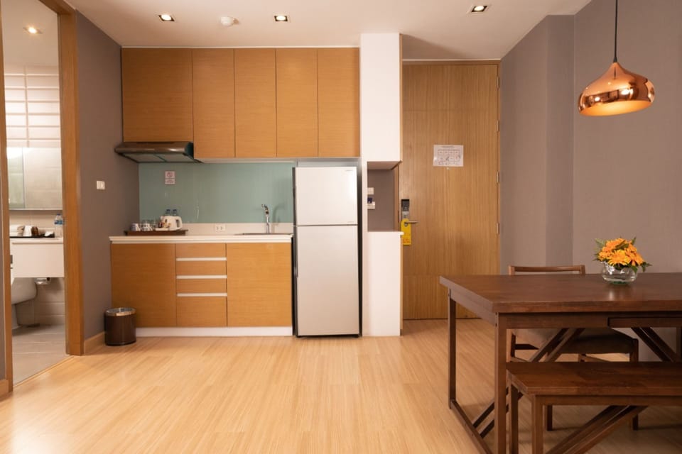 Suite, 1 King Bed | Living area | 50-inch LCD TV with digital channels, TV