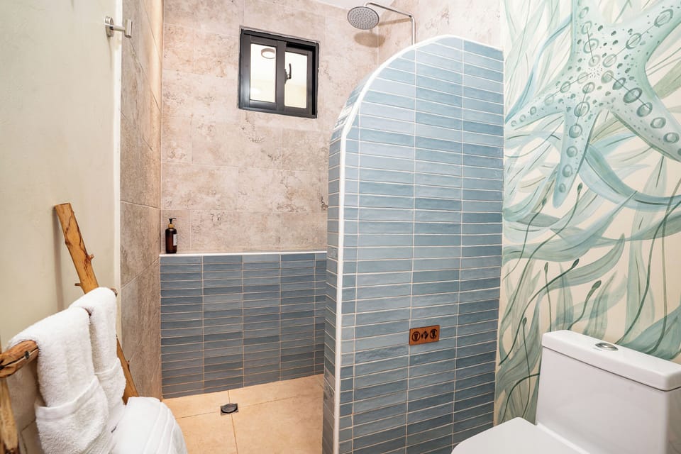 Standard Double Room, Garden View | Bathroom | Shower, hair dryer (on request), towels, soap