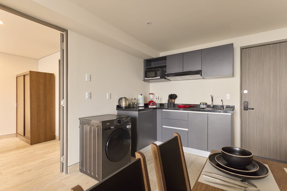 Comfort Apartment, City View | Private kitchen | Fridge, microwave, stovetop, cookware/dishes/utensils