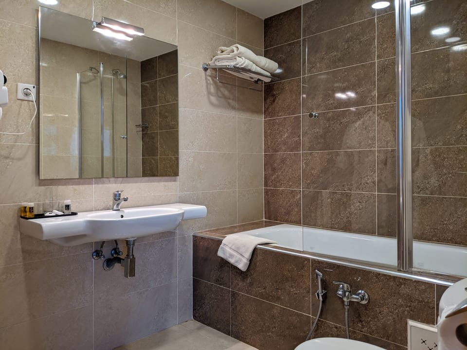Hair dryer, towels, soap, shampoo