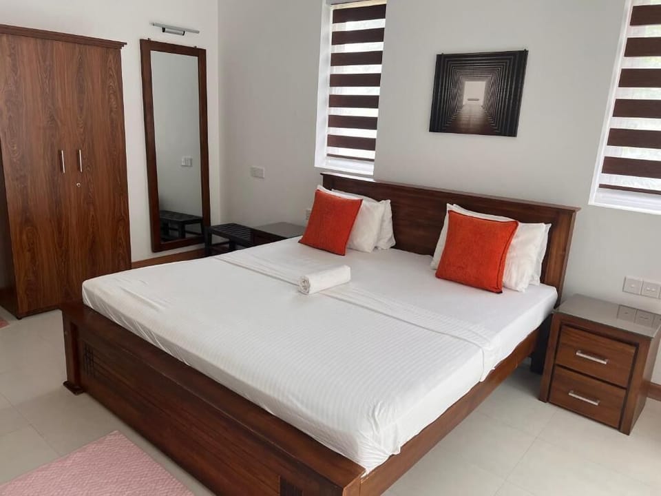 Deluxe Double Room, Patio, Garden View | In-room safe, desk, laptop workspace, blackout drapes
