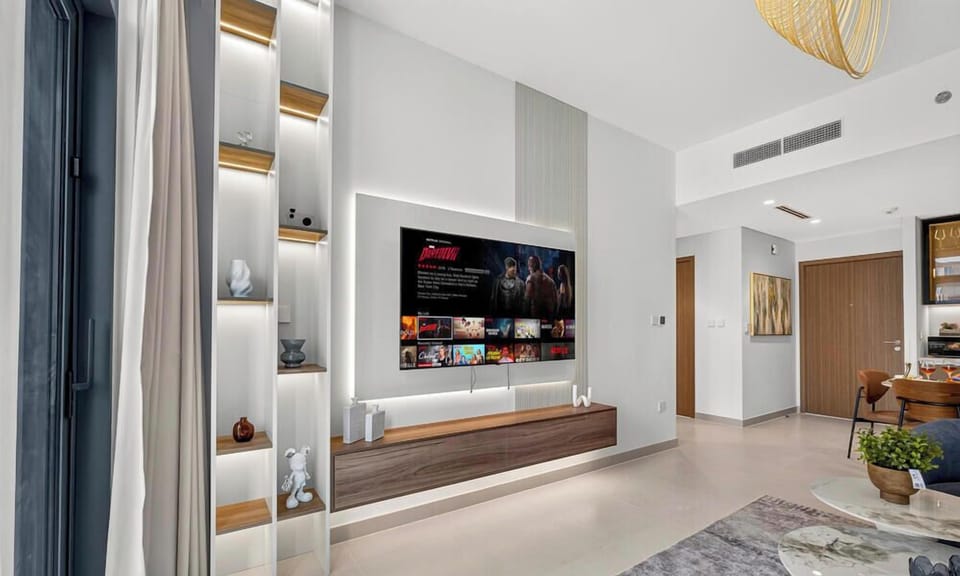 Premium Apartment, 1 King Bed with Sofa bed, City View | Living area | 65-inch Smart TV with digital channels, Netflix, streaming services