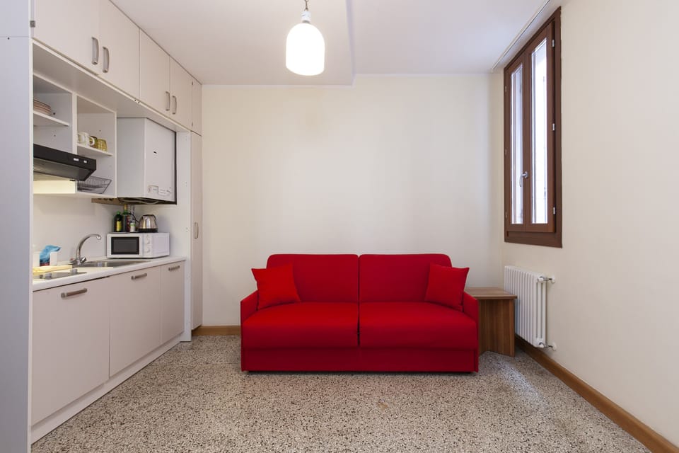 Standard Apartment, 1 Bedroom, Annex Building | Living area | 30-inch TV with digital channels
