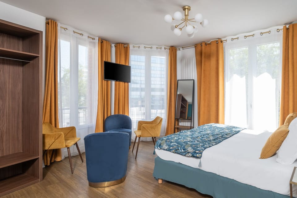 Executive Quadruple Room, Non Smoking, City View | Premium bedding, down comforters, individually furnished, desk