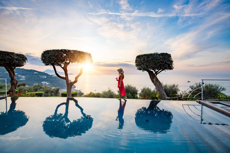 Seasonal outdoor pool, open 9 AM to 7 PM, pool umbrellas, sun loungers