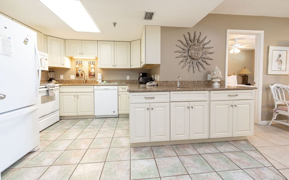 Condo, 2 Bedrooms | Private kitchen | Coffee/tea maker, fridge, oven