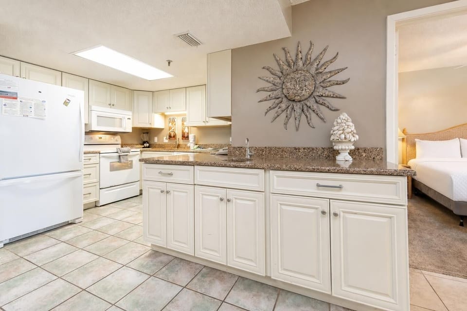 Condo, 2 Bedrooms | Private kitchen | Coffee/tea maker, fridge, oven